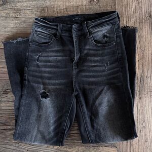 Risen black distressed straight leg jeans
